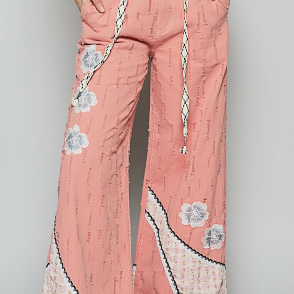 P195 POL floral patchwork relaxed fit pants in denim with embroidery detail.